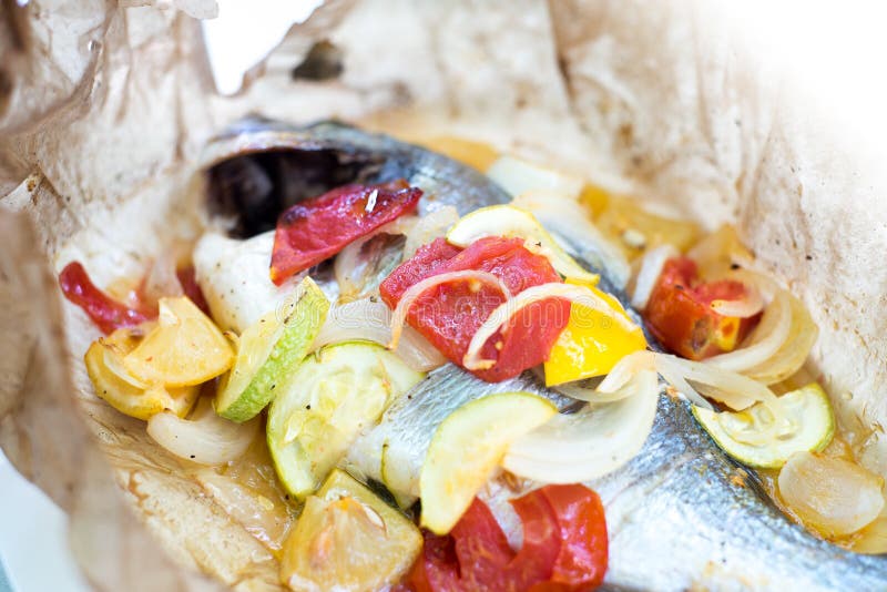 Oven Roasted Fish with Vegetables Stock Photo Image of lemon, paper 59089324
