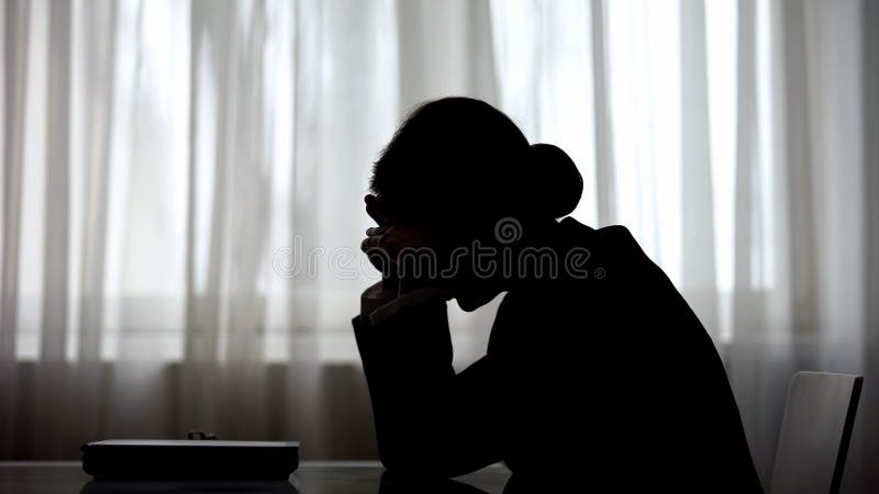 Over exhausted woman putting head on hands, tired of night shift, deadline royalty free stock images Over exhausted woman putting head on hands, tired of night shift, deadline royalty free stock images