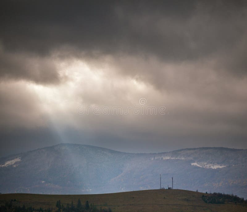 Overcast scene in cloudy mountains. Autumn rain. Hill, cloud.