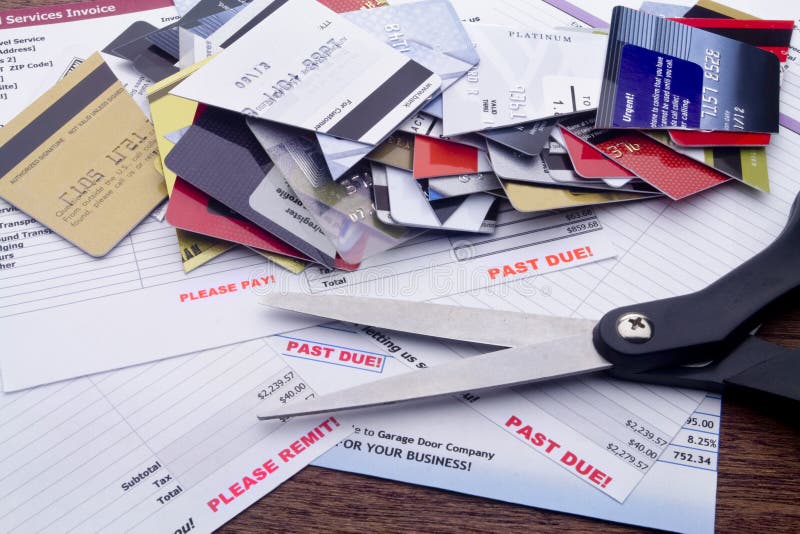 Overdue Bills, Scissors, & Cut Up Credit Cards stock photo
