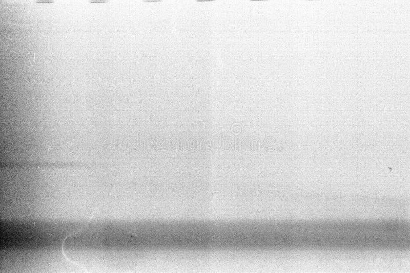 Overexposed noisy film frame with heavy noise, dust and grain