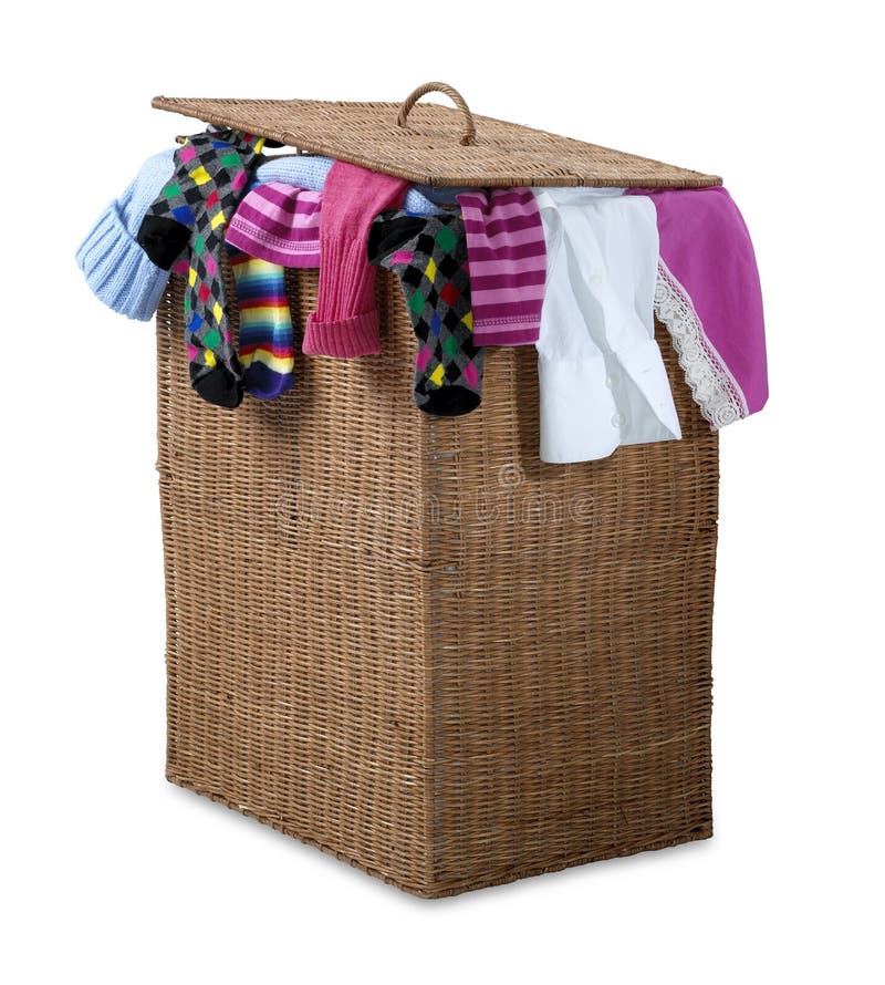 An overflowing wicker laundry basket isolated on white with clipping pathsh...