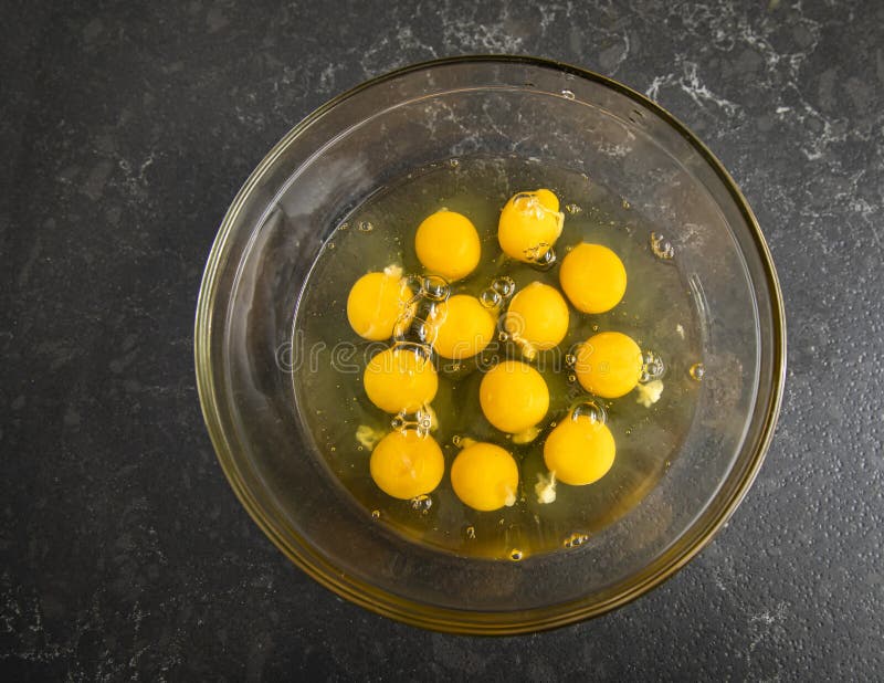 Overhead Image of Twelve Egg Yolks in a Glass Bowl Stock Image Image