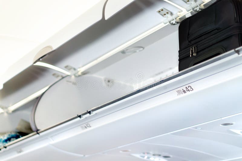 Overhead locker and compartment for baggage in airplane. royalty free stock photos Overhead locker and compartment for baggage in airplane. royalty free stock photos