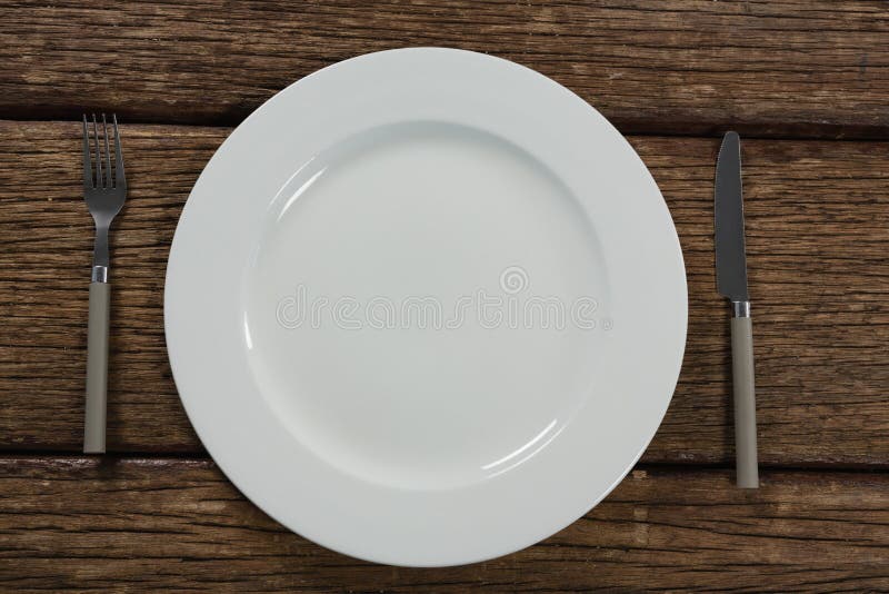 Plate and Cutlery Set Elegantly on a Table Stock Image Image of dcor