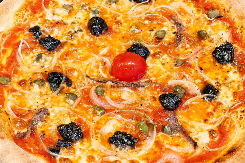 Pizza siciliana (pizza with sardines), Sicily, Italy, Stock Photo