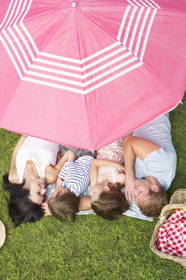 Overhead View Of Family Enjoying Picnic Together stock photos Overhead View Of Family Enjoying Picnic Together stock photos