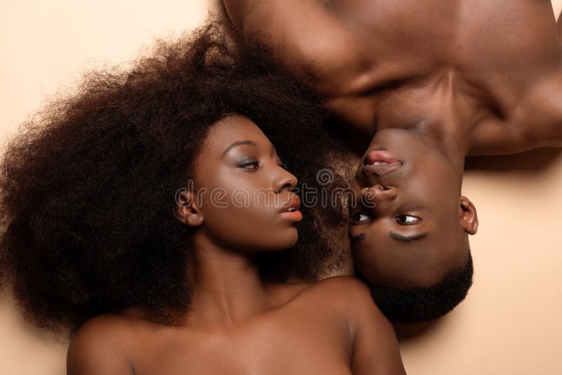 Nude African-American Couple Embracing