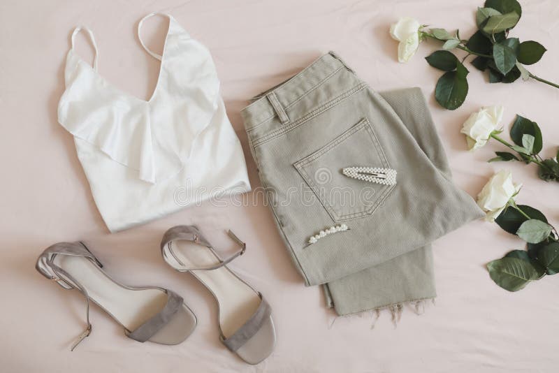 Overhead View of Woman S Casual Spring Summer Outfit. Jeans, White Blouse,  Sandals and Bouquet of Flowers on Beige Stock Image - Image of fashion,  girl: 214384615