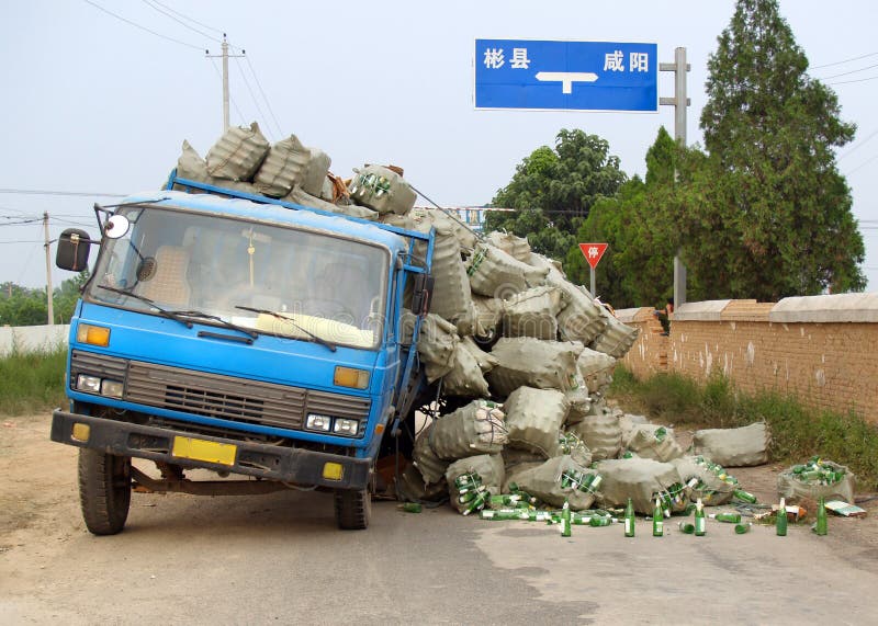 Overloaded with bags of waste, vehicle moves on higway, Shiraz, Iran. –  Stock Editorial Photo © grigvovan #167601202