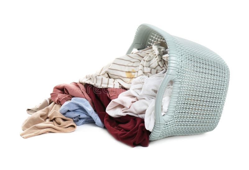 Overturned Laundry Basket Full of Clothes Isolated on White Stock Image
