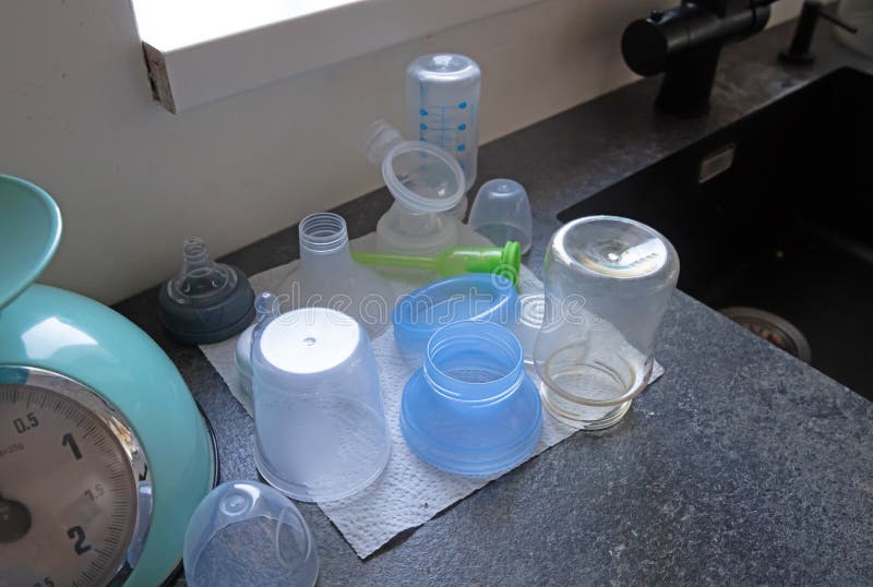 Overview of Several Sterilized Bottles and Cups for a Baby Stock Image