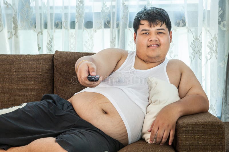 Lazy Fat Guy Watching Tv Photos - Free &amp; Royalty-Free Stock Photos from  Dreamstime