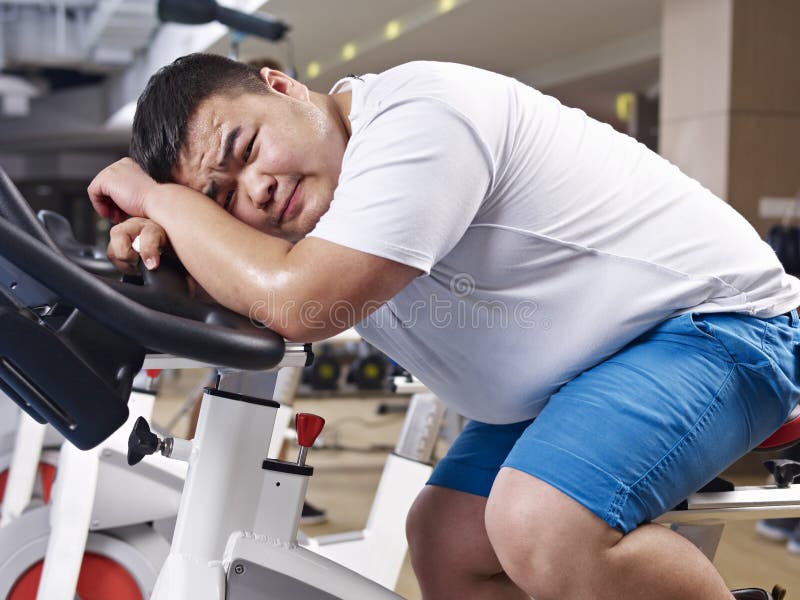 Overweight man exercising