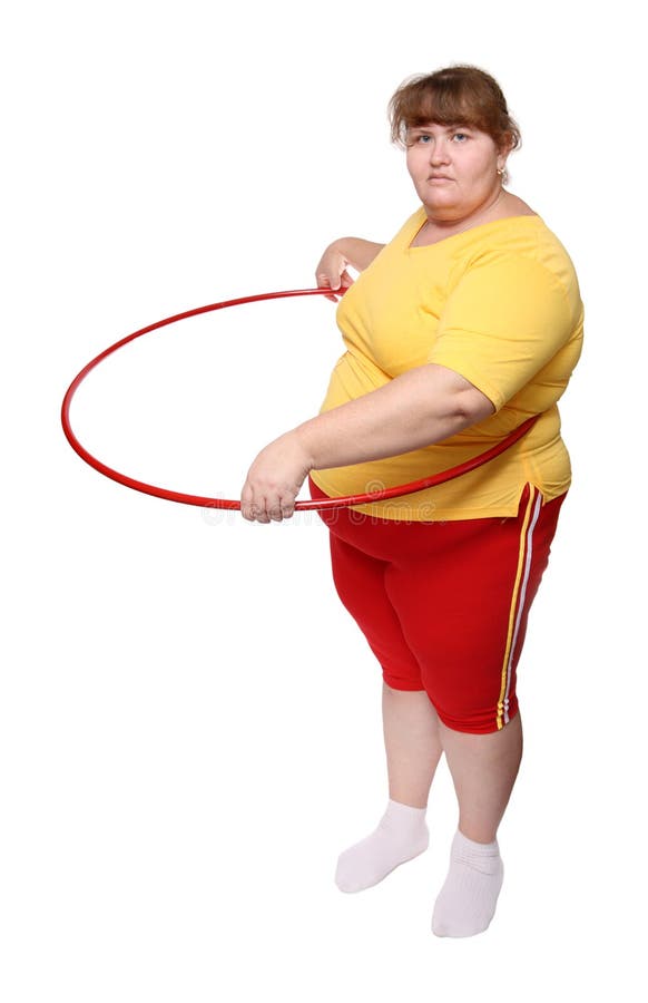Overweight woman exercising with hoop stock photos