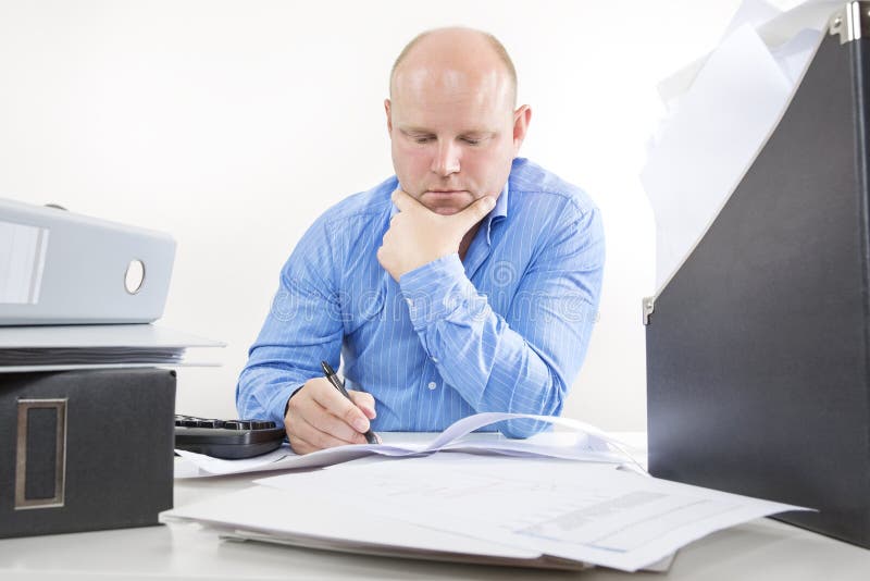 Overworked Businessman at the Office Stock Photo - Image of holding ...