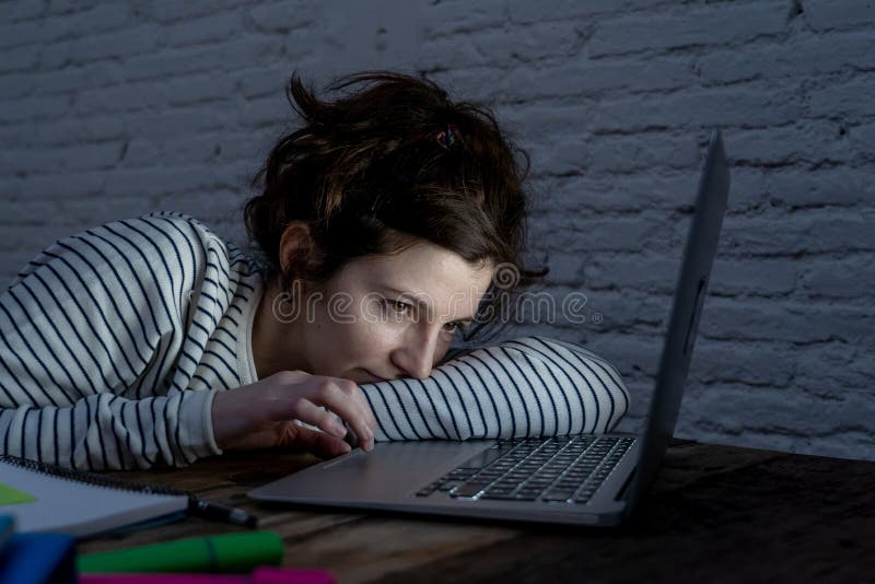 Close up portrait of a overworked and tired young woman studying royalty free stock photography Close up portrait of a overworked and tired young woman studying royalty free stock photography