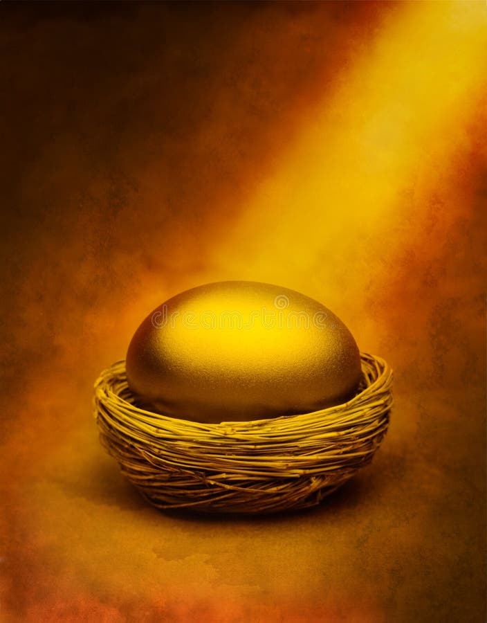 A gold egg in a nest with a golden shaft of light. A gold egg in a nest with a golden shaft of light