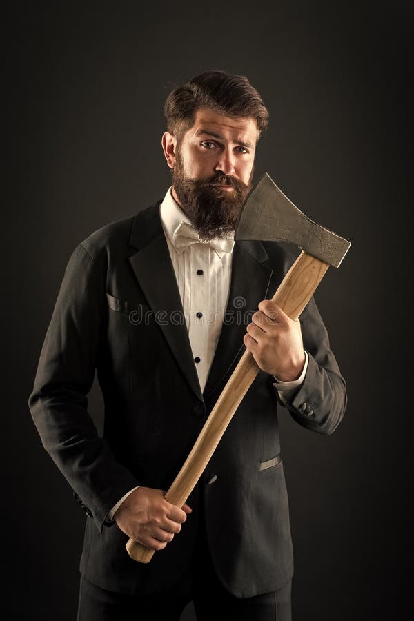 Own opinion. Decision was made. Man brutal hipster with axe. Sharp ax hand confident guy. Masculinity and brutality
