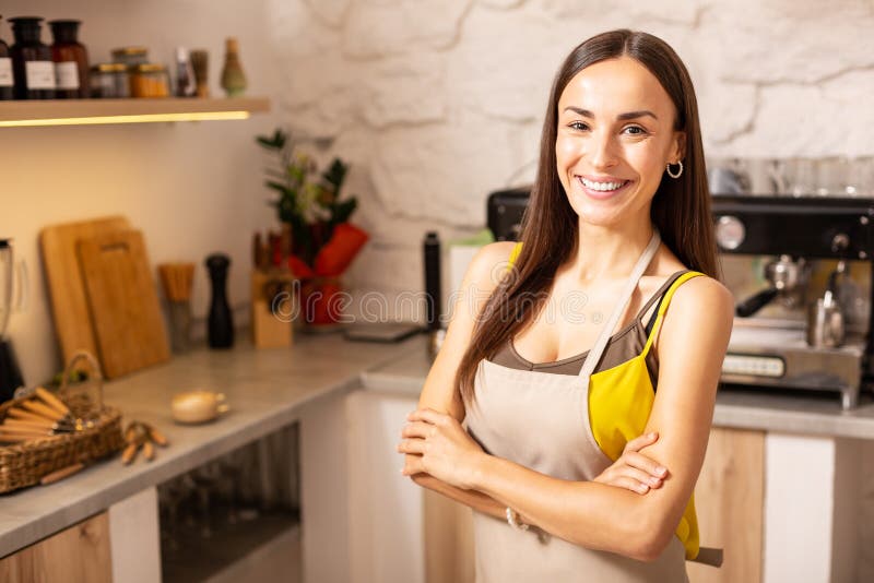 Businesswoman owning coffeehouse feeling extremely happy royalty free stock photography Businesswoman owning coffeehouse feeling extremely happy royalty free stock photography