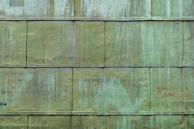Oxidized Copper Folded Sheet Metal on Roof. Copper Wall Texture