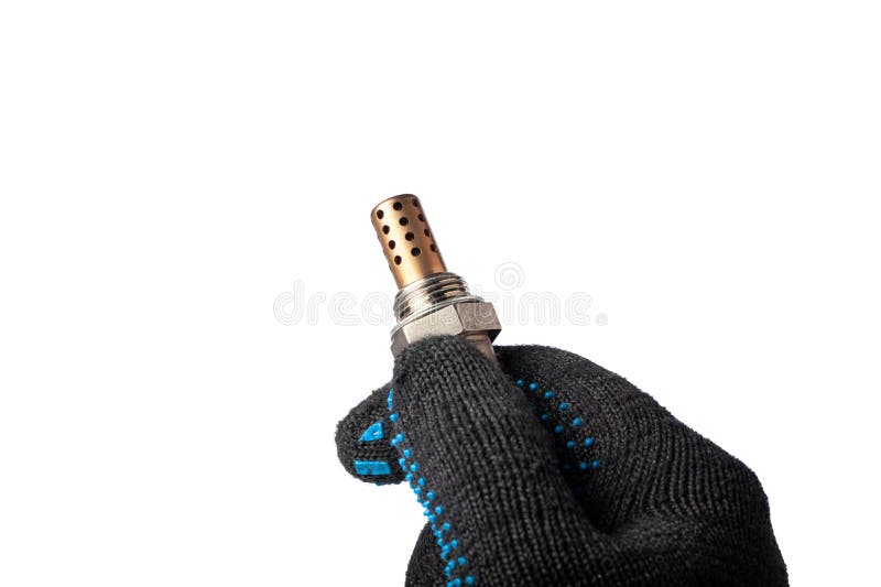Oxygen sensor for gasoline and diesel engines in the hand isolated on white background. Mechanic holds oxygen sensor royalty free stock photo