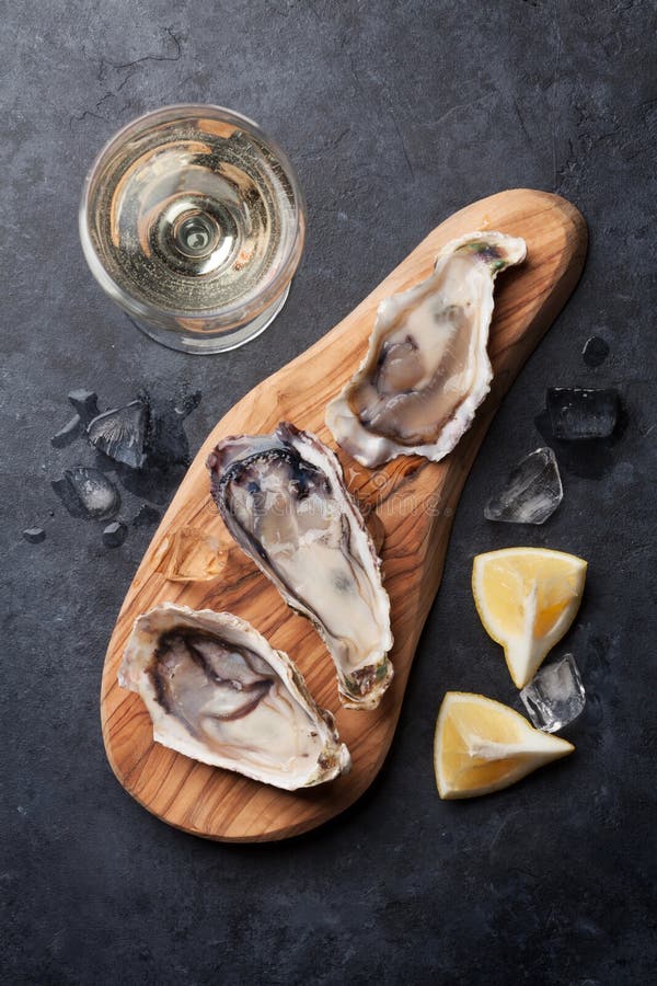 Oysters and wine stock photo. Image of cold, black, crustacean 89841840