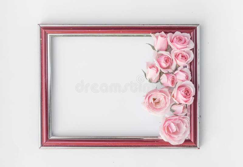 Ornamental vintage frame with pink roses flowers in the corner . Floral design template isolated . Page decoration. Birthday card, wedding invitations. 3d rendering . Ornamental vintage frame with pink roses flowers in the corner . Floral design template isolated . Page decoration. Birthday card, wedding invitations. 3d rendering .