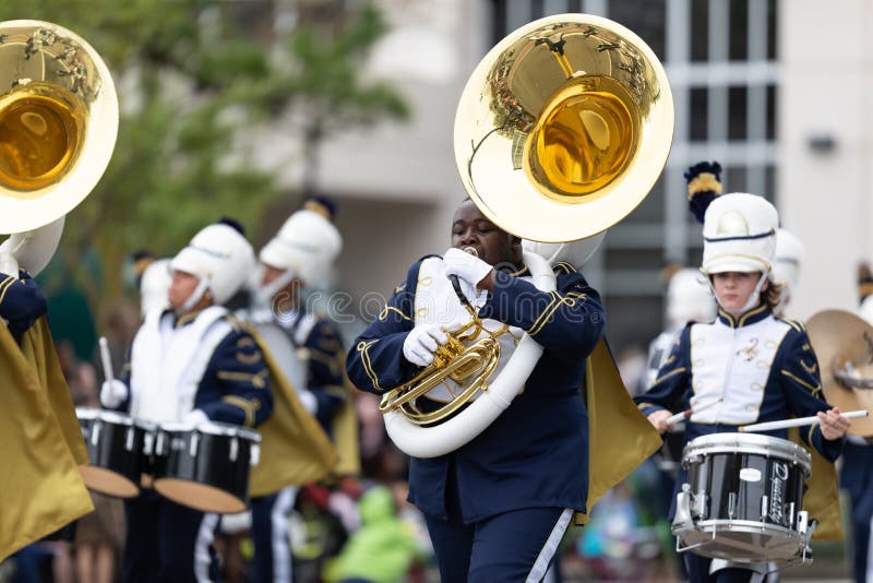 Wilmington, North Carolina, USA - April 6, 2019: The North Carolina.Azalea Festival, Members of the North Brunswick High School Marching Scorps, perform during the parade. Wilmington, North Carolina, USA - April 6, 2019: The North Carolina.Azalea Festival, Members of the North Brunswick High School Marching Scorps, perform during the parade