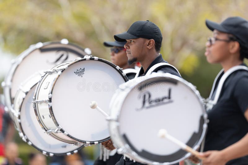 Wilmington, North Carolina, USA - April 6, 2019: The North Carolina.Azalea Festival, Members of Mt. Carmel Baptist Church Bishop C. V. Russell Jr. Marching Ambassadors, performing at the parade. Wilmington, North Carolina, USA - April 6, 2019: The North Carolina.Azalea Festival, Members of Mt. Carmel Baptist Church Bishop C. V. Russell Jr. Marching Ambassadors, performing at the parade