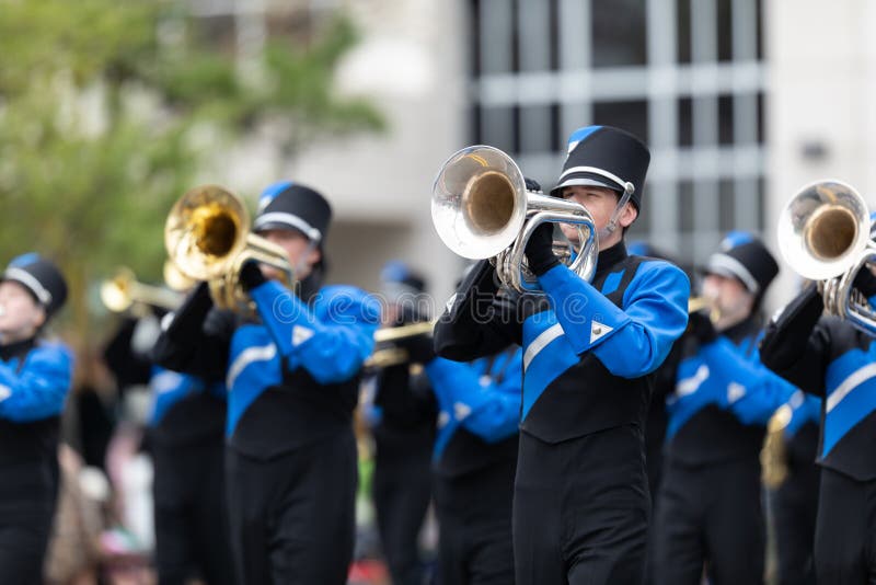 Wilmington, North Carolina, USA - April 6, 2019: The North Carolina.Azalea Festival, Members of Hoggard High School Marching Vikings, performing at the parade. Wilmington, North Carolina, USA - April 6, 2019: The North Carolina.Azalea Festival, Members of Hoggard High School Marching Vikings, performing at the parade