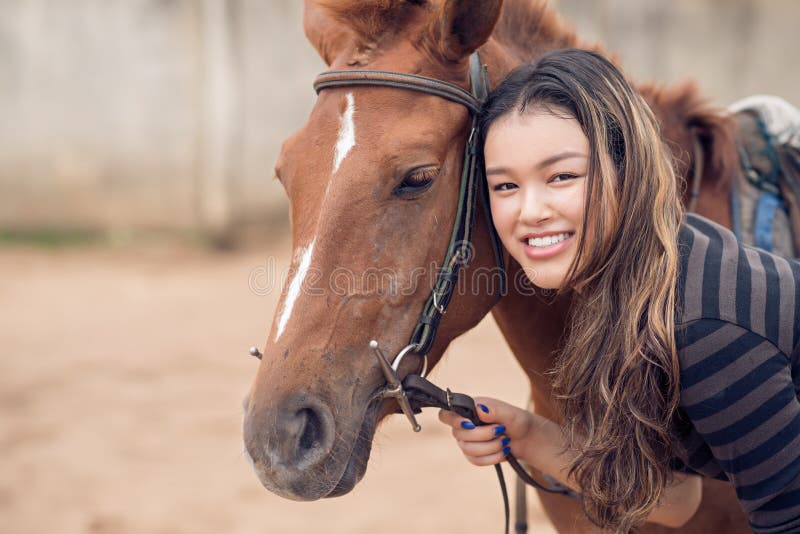 Portrait of beautiful girl with a chestnut pony. Portrait of beautiful girl with a chestnut pony