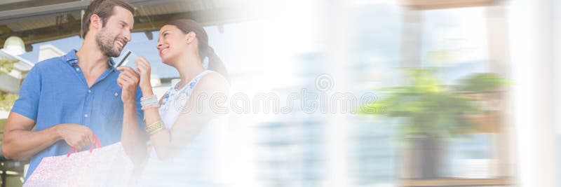 Paar die met motieovergang winkelen stock fotografie Paar die met motieovergang winkelen stock fotografie