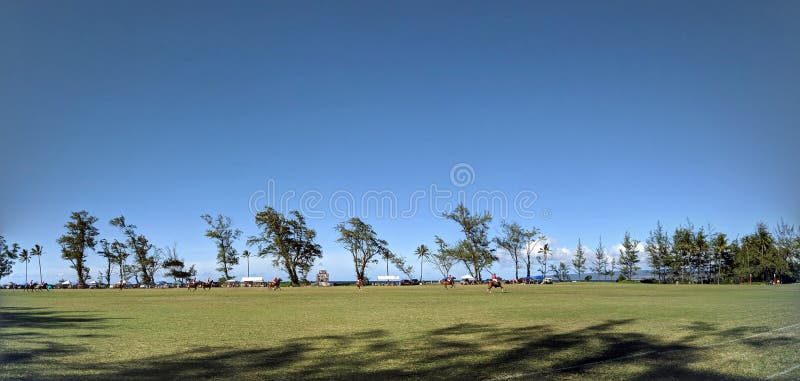Paardenrennen in een Polo Game bij de Hawaii Polo Club royalty-vrije stock afbeeldingen Paardenrennen in een Polo Game bij de Hawaii Polo Club royalty-vrije stock afbeeldingen