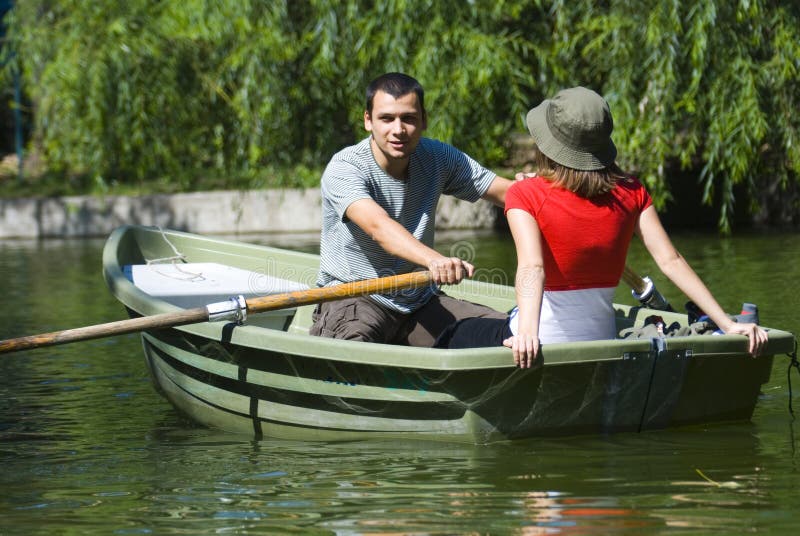 Paare im Rowboat Paare im Rowboat