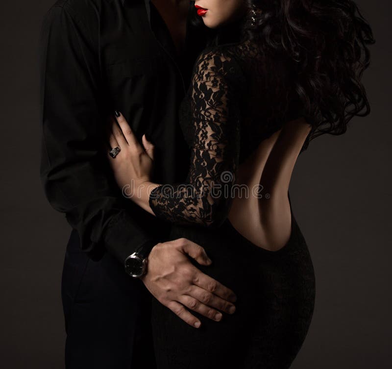 Paare im Schwarzen, Frauen-Mann keine Gesichter, sexy Dame Lace Dress Paare im Schwarzen, Frauen-Mann keine Gesichter, sexy Dame Lace Dress
