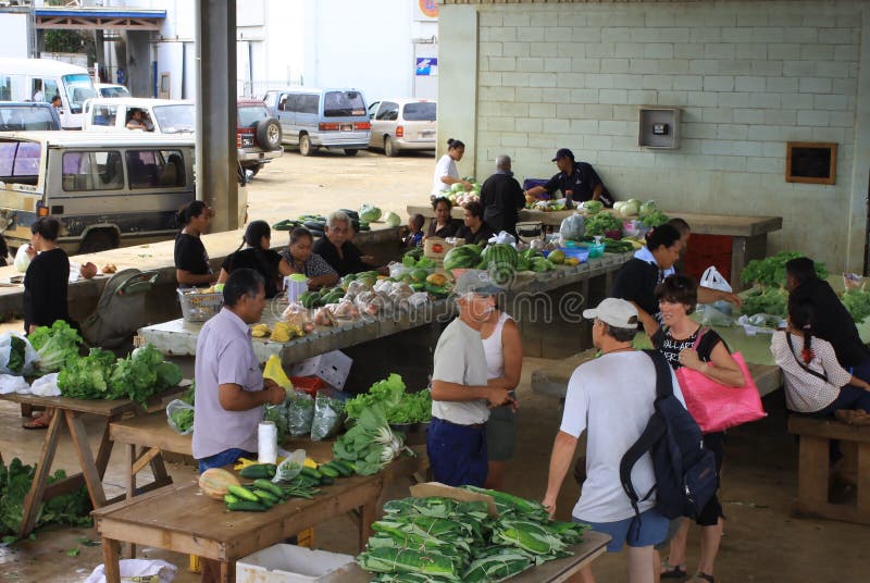 Scene at the local fruit and veggie market in Vava'u, Tonga which sustains the income of the locals and is a must for visitors. Fruit scene stock images, royalty-free photos and pictures