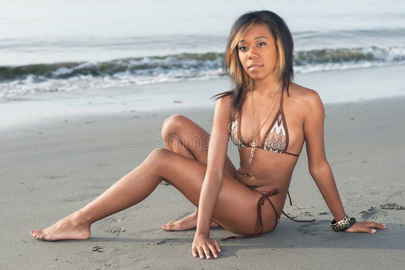 Pacific islander girl on a beach.