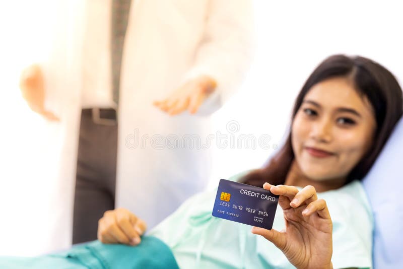 Pacjent z kredytową kartą dla asekuracyjnego pojęcia obrazy royalty free