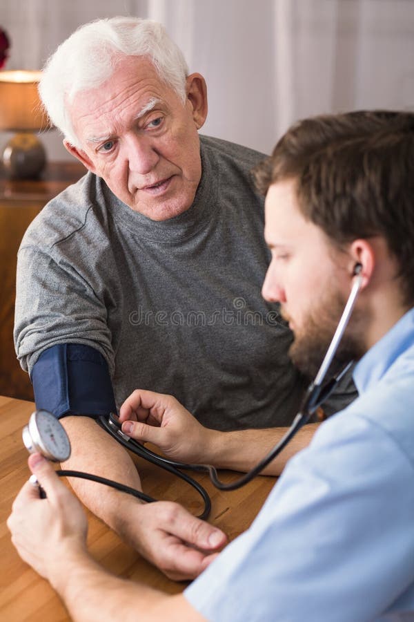 Male patient with hypertension in cardiologist's office. Male patient with hypertension in cardiologist's office