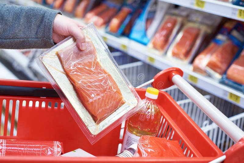 Pack Of Salmon In Hand At Store Stock Photo Image of orange, sale