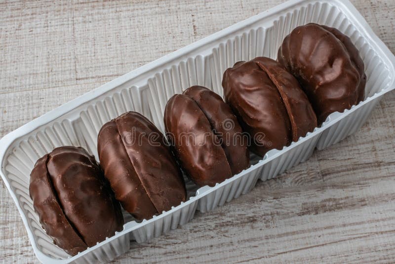 A Package of Chocolate Marshmallows Closeup Lying on a Wooden Table