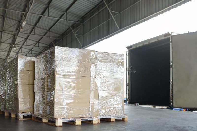 Packaging Boxes Wrapped Plastic on Pallets Loading into Shipping Cargo