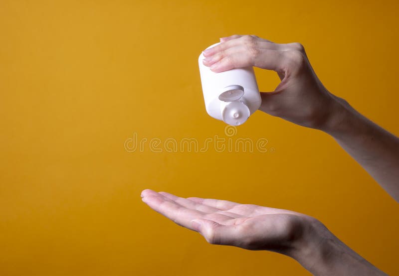 Packaging of Lotion or Hand Cream in Female Hands Stock Image Image