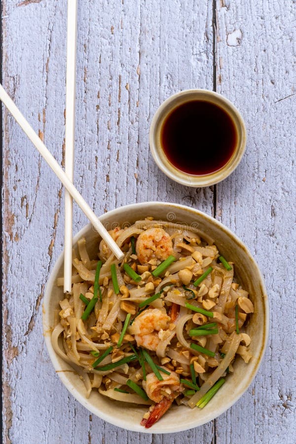 Pad Thai Rice Noodles with Prawns and Peanuts. Typical Thai Food Stock