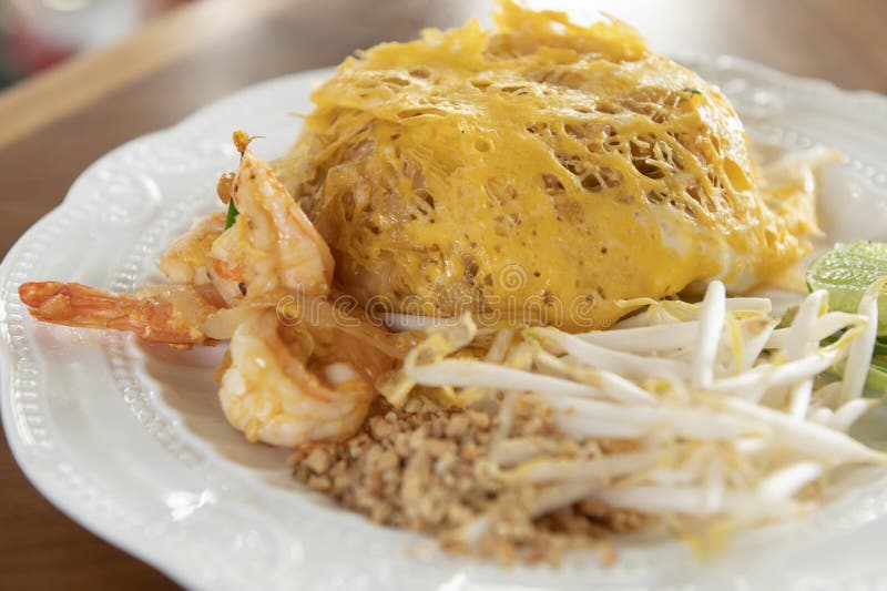 Pad Thai Wrapped in Egg on a White Plate Stock Image Image of view