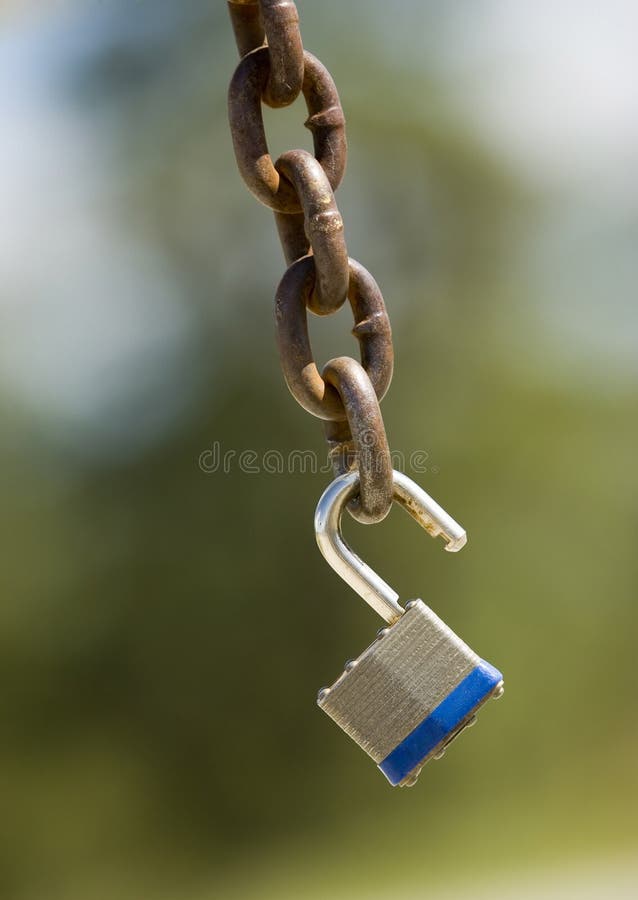 Padlock on chain stock photo. Image of freedom, released 1938858