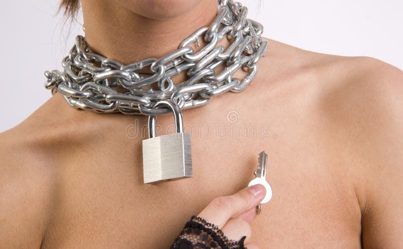 Padlock and chain around young female neck