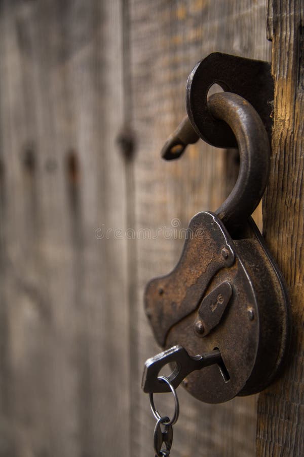 A Padlock Hangs on the Door Hinge Stock Photo Image of gate, entry