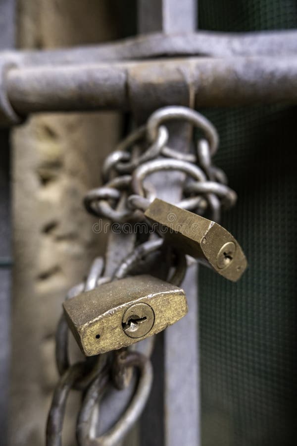 Padlocks on fence stock photo. Image of gate, fence 243979140